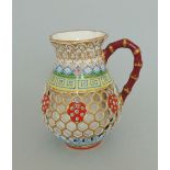 A Kerr and Binns jug, honeycomb reticulated body with a fluted rim, gilt, red, blue,