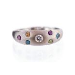 A multicoloured diamond set white gold band ring,