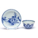 An 18th Century Chinese Nanking Cargo tea bowl and saucer, pagoda and river landscape pattern,