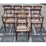 A set of early 19th Century rosewood bar back chairs, scroll carved back rails, canework seats,