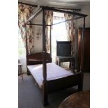 A 19th Century mahogany four poster bed