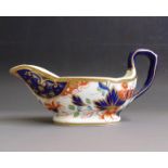 An English porcelain sauce boat, imari style decoration, circa 1830, 17.