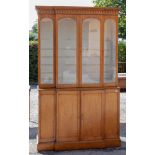 A 19th Century Birds Eye Maple bookcase, of breakfront form,