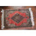 A modern small Persian silk rug,