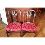 A set of eight Georgian style mahogany dining chairs, 19th Century, with pink upholstered seats,