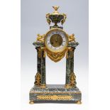 A late 19th Century French green veined marble bracket clock, circa 1880, of Baroque design,