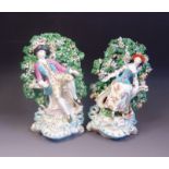 A pair of Derby figures of fisherman and woman, circa 1765, patch marks,