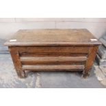 A late 17th/early 18th Century miniature oak chest, plank top, horizontal panelled front and sides,