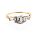 An Art Deco diamond five-stone 18ct gold ring, five baguette-cut diamonds, centre diamond approx 0.