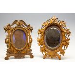 Black forest oval victorian photo frame decorated with carved lion and lioness heads an eagle to to