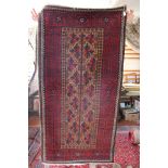 Persian red and amber ground rug
