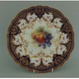 A Royal Worcester cabinet plate, painted with fruit by Richard Seabright,
