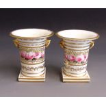 A pair of Coalport spill vases,