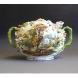 A Minton flower encrusted globe shaped pot and cover with twin handles,