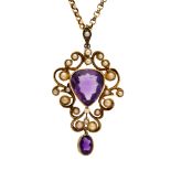 An Edwardian amethyst and pearl set 15ct gold drop pendant,