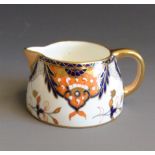 A Davenport 'Ships' cream Jug, pattern No.2617, imari style, circa 1870-86, 10cm wide, 4.