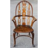 A 18th / 19th Century Gothic style ash and elm seated Windsor armchair,