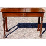 A George III Irish mahogany serving table circa 1810, carved and fluted front legs,