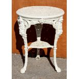 A Victorian style cast iron white painted garden table of two tier form,