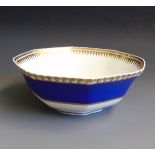 A Spode felspar octagonal slop bowl, decorated with a deep blue band and gilding, pattern No.