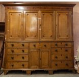 A George III oak and mahogany cross-banded housekeepers cupboard, circa 1800,