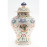 A pair of Chinese famille rose baluster jars and covers, mid 19th Century,