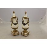 A pair of 19th Century French ormolu mounted cararra marble garnitures, acorn finial covers,