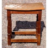 A small 1940/50s Robert Thompson 'Mouseman' oak side table with 'concave' top and tapered ??