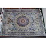 An Isfahan blue and beige carpet,