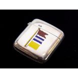 A Victorian silver vesta case, the front enamelled with three nautical flags symbolising B, J,