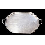 A George VI silver two handled shaped rectangular tray, raised border, Birmingham, 1948,