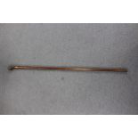 A late 19th/ early 20th Century rosewood walking cane, horn handle, brass ferrule,