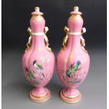 A pair of English porcelain vases and covers,