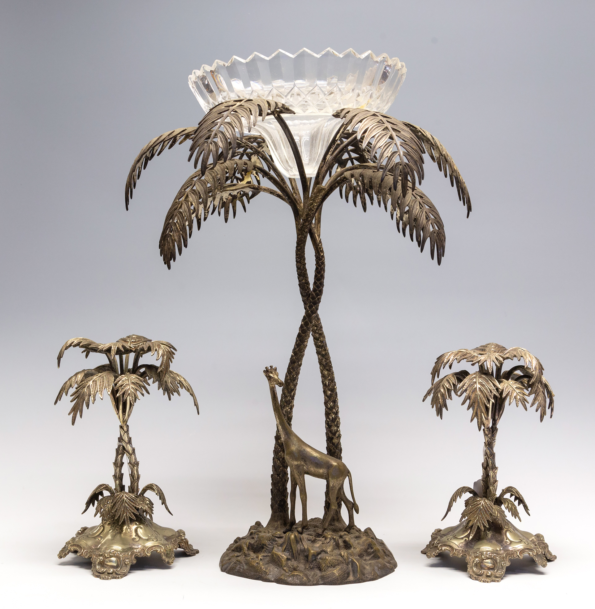 A Mappin & Webb EPNS epergne cast as giraffe and palm tree garniture,