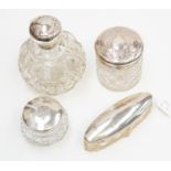 An Edwardian large silver topped cut glass ovoid scent bottle,