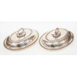 A pair of silver plated tureens,