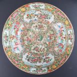 A 19th century Chinese Cantonese export famille rose bowl, decorated with panels of figures, birds