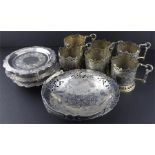 An Islamic white metal niello swing handle basket, having pierced rim with niello floral swags and