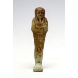 Egyptian Bright Faience Shabti Late Period, C. 664 - 332 BC. An Egyptian faience shabti with clear