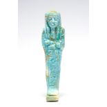 Egyptian Faience Shabti Third Intermediate Period, 718 BC. A light green glazed faience shabti