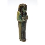 Egyptian Faience Ramesside Ushabti c.1300 - 1100 BC. A dark green glazed faience mummiform figure in