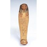 Egyptian Painted New Kingdom Ushabti New Kingdom, C. 1100 BC. A Nile clay formed mummiform figure