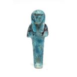 Egyptian Faience Shabti Figure Third Intermediate Period, C. 730 BC. A vibrant blue glazed faience