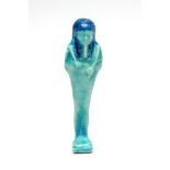 Egyptian Bichrome Glazed Faience Shabti Figure Ptolemaic Period, C. 300 BC. A vibrant ushabti in
