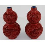 **REOFFER JAN ETWALL £150/£200** A pair of 20th century Chinese Cinnabar double gourd vases. 21.