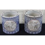 **REOFFER JAN ETWALL £1000/£1500** A pair of Chinese polychrome porcelain brush pots, decorated with