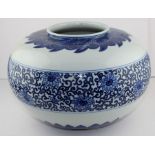 **REOFFER JAN ETWALL £40/£60** A 20th century Chinese porcelain bowl, painted with blue floral