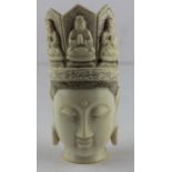 **REOFFER JAN ETWALL £80/£120** A 19th century Tibetan ivory head, carved with an elaborate