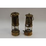 Two brass miners lamps