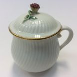 A Derby custard cup and saucer; `anchor over D' (in gilt) mark, c1775,